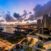 Vista panorámica de Barranquilla al atardecer, que refleja la belleza de la ciudad y su próspero mercado de alquiler.
