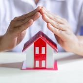 Representación de vivienda protegida con un seguro para casa